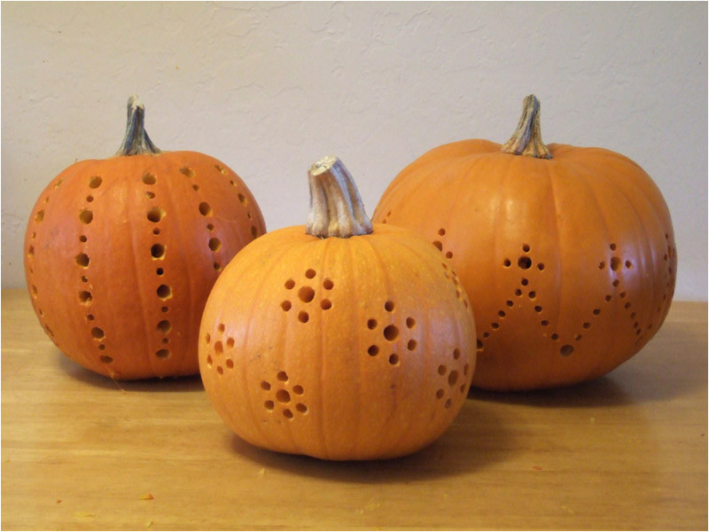 pumpkins carved with a drill