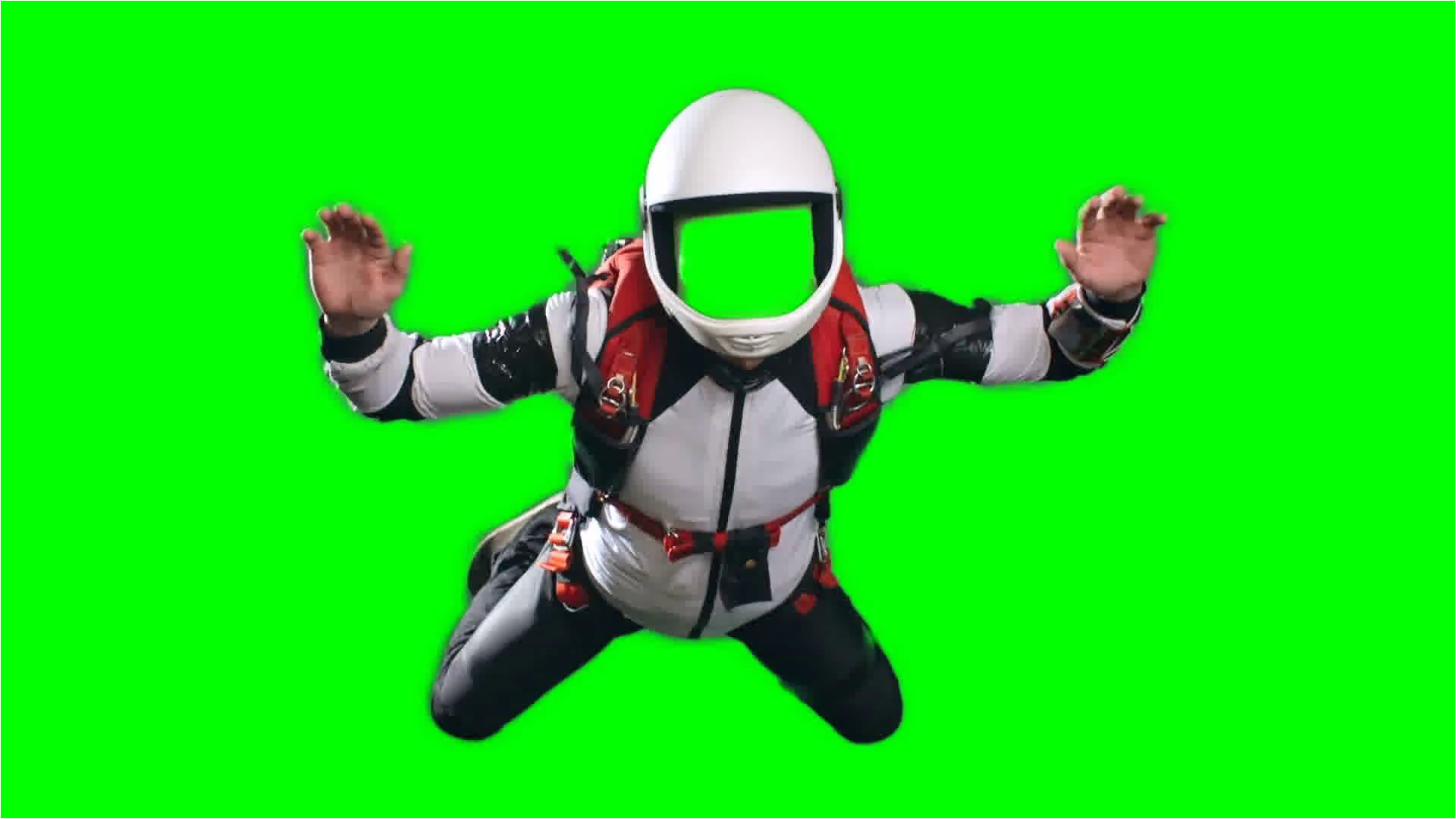 no face chroma key template for video editing slow motion shot of young man parachutist in full gear white helmet jumpsuit and harness performing free fall against green screen background h0t2yrboisfkk984