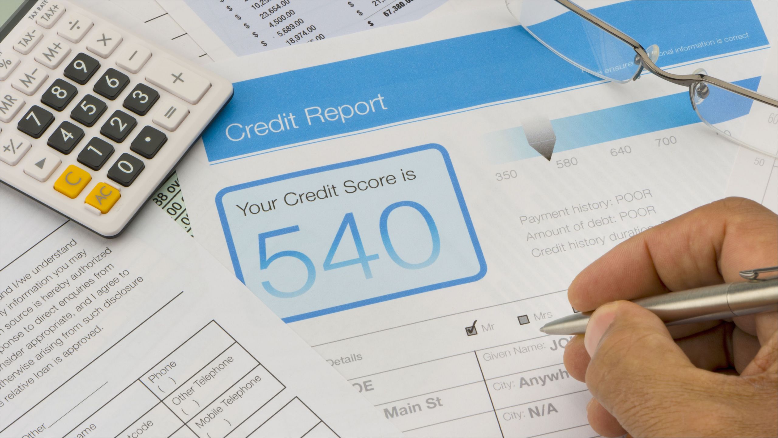 credit report form on a desk 643153146 59bc281922fa3a0011d499d9 jpg