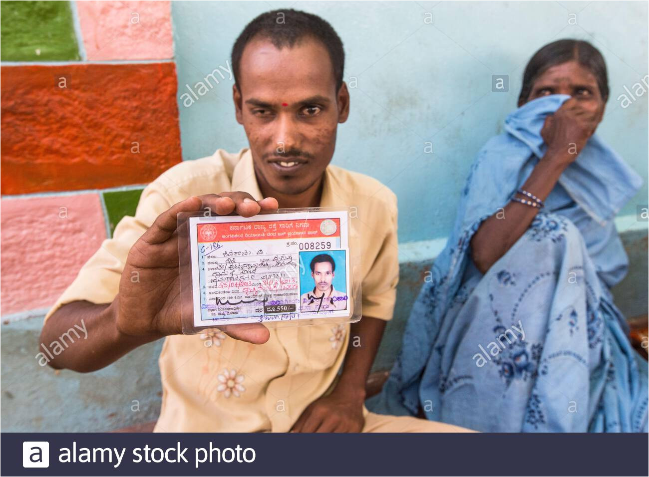 caption visually impaired self help group shg member shivaraju proudly displays the bus pass that his membership of the group has helped him to sec 2akh7g0 jpg